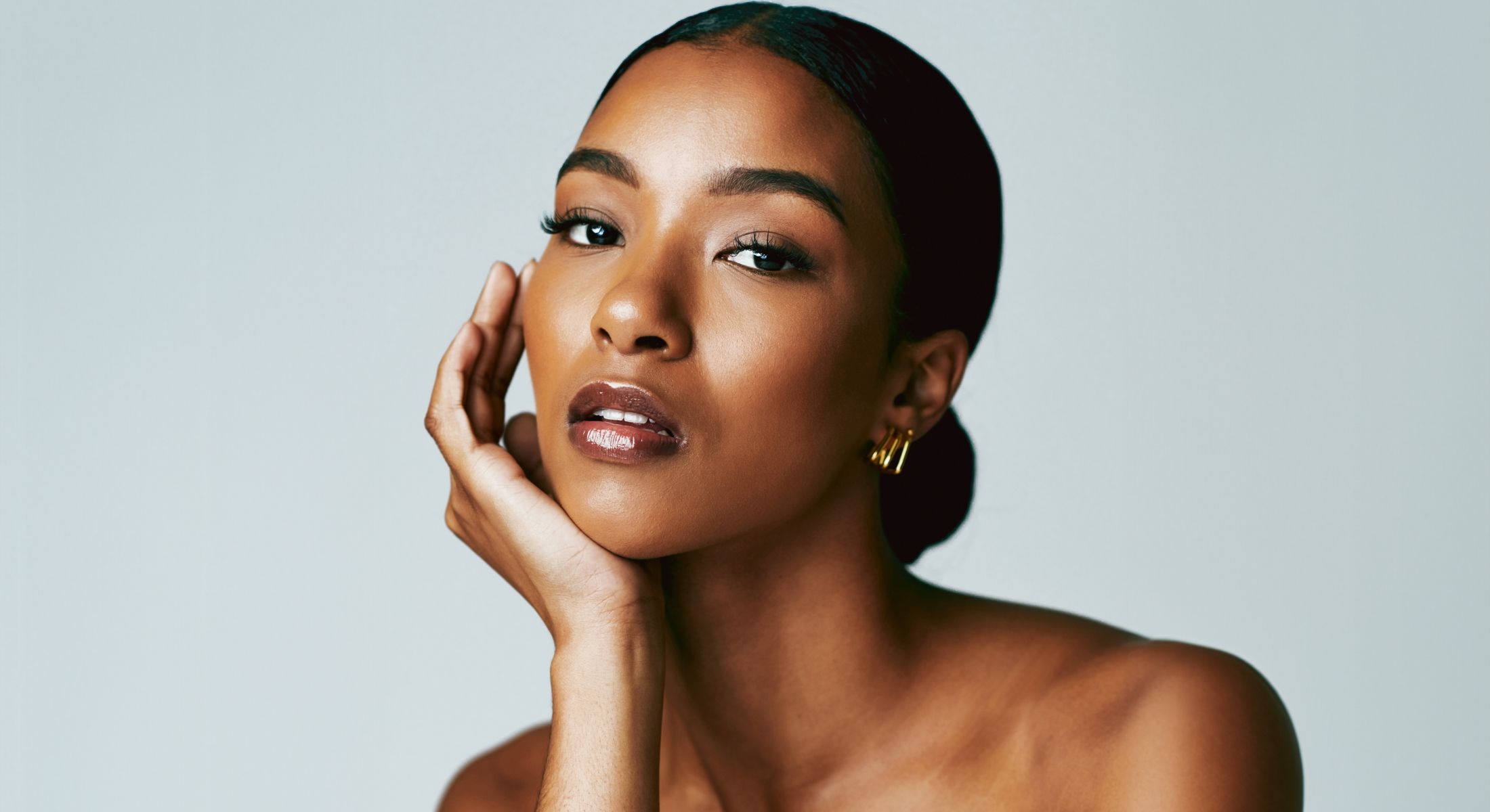 Portrait of a woman with elegant styling.